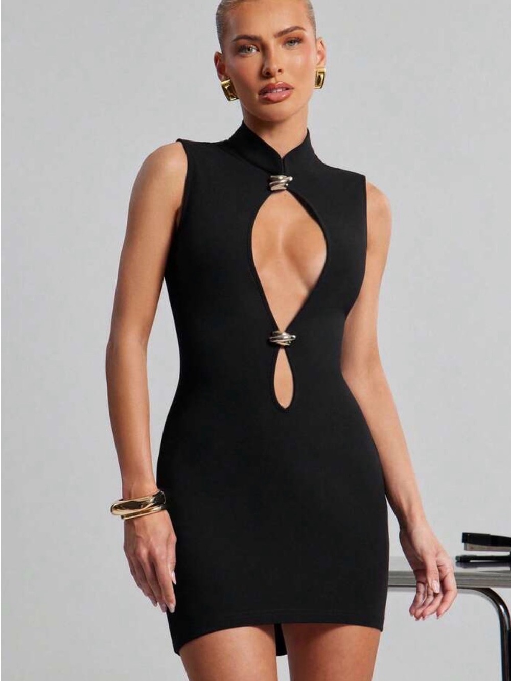 SHEIN Black Sleeveless Mini Dress with Keyhole Cutouts and Metallic Rings